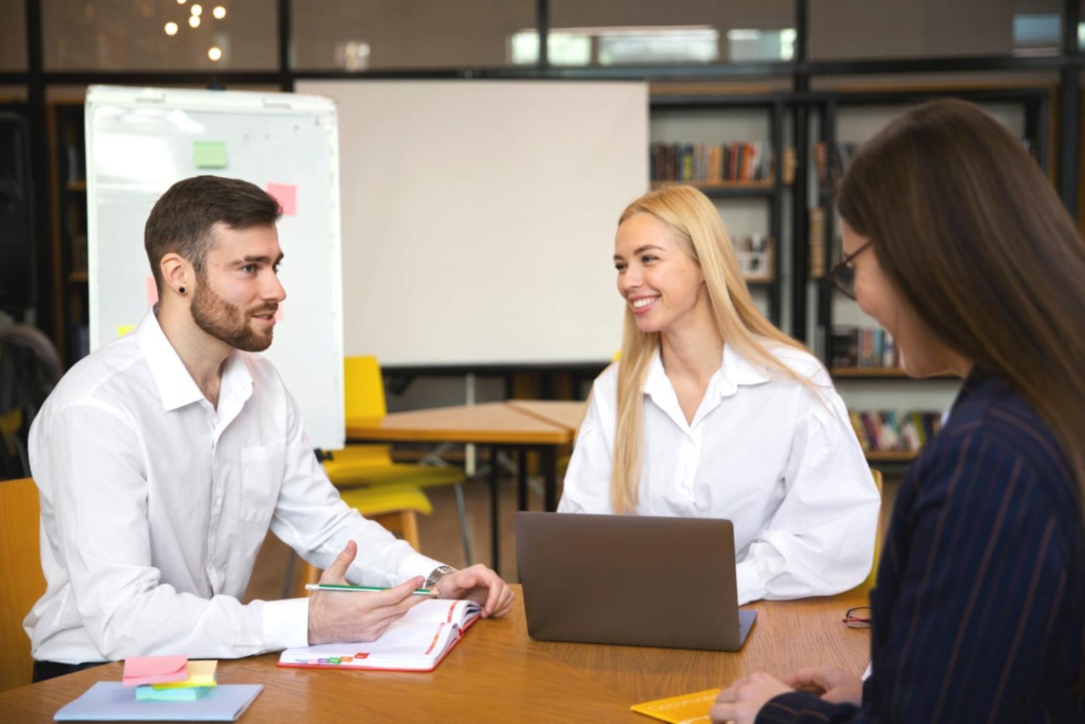 Business planning session with financial documents and calculator